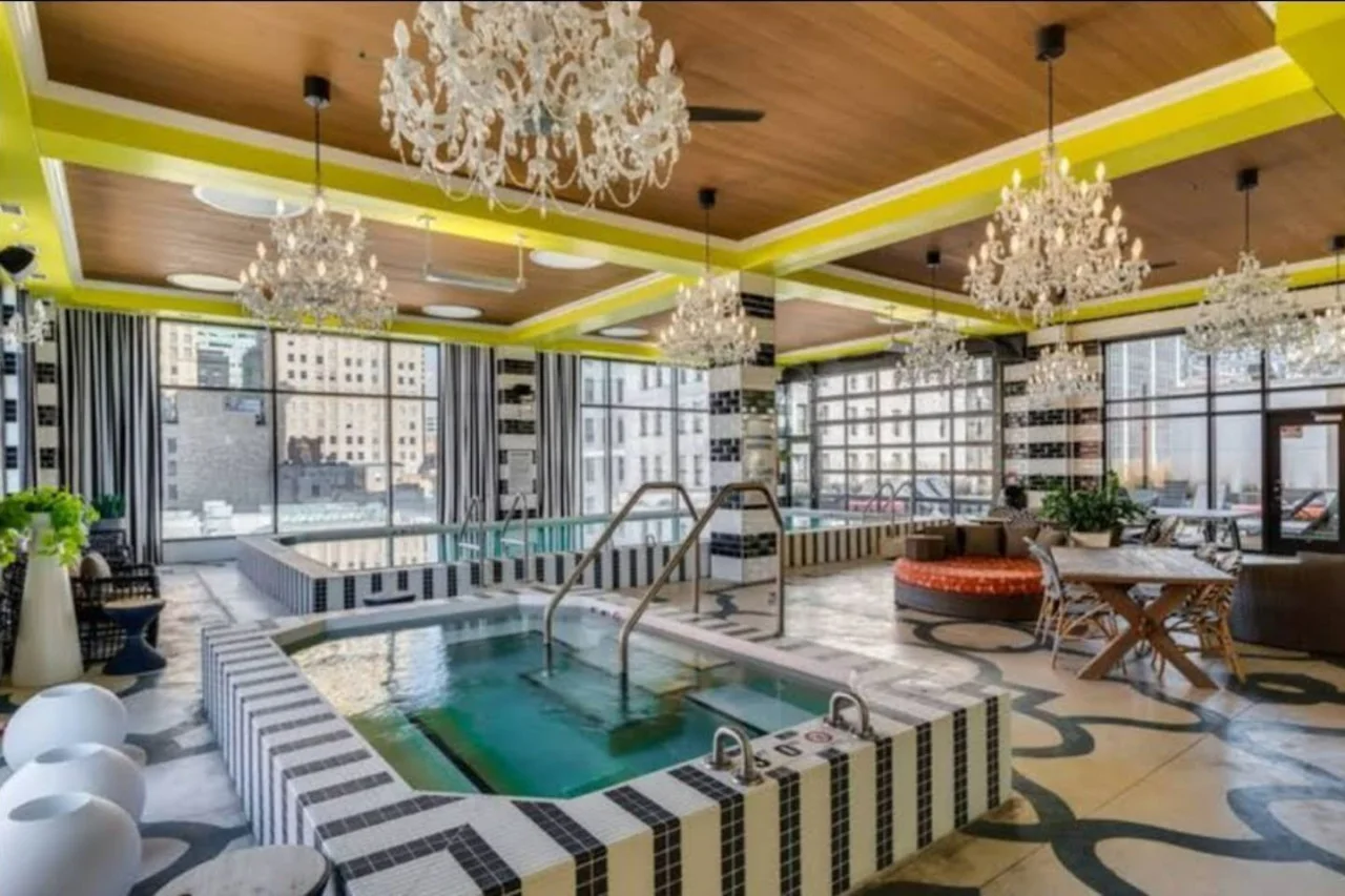 You can imagine yourself lounging by the pool, surrounded by greenery and the gentle sound of water.