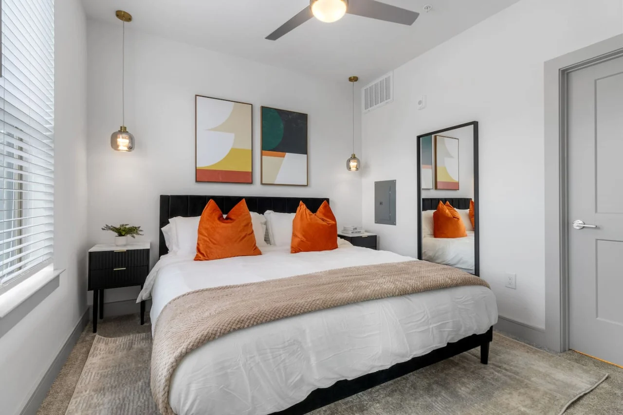The bedroom’s serene ambiance invites you to relax, with a plush bed that promises a restful night's sleep.