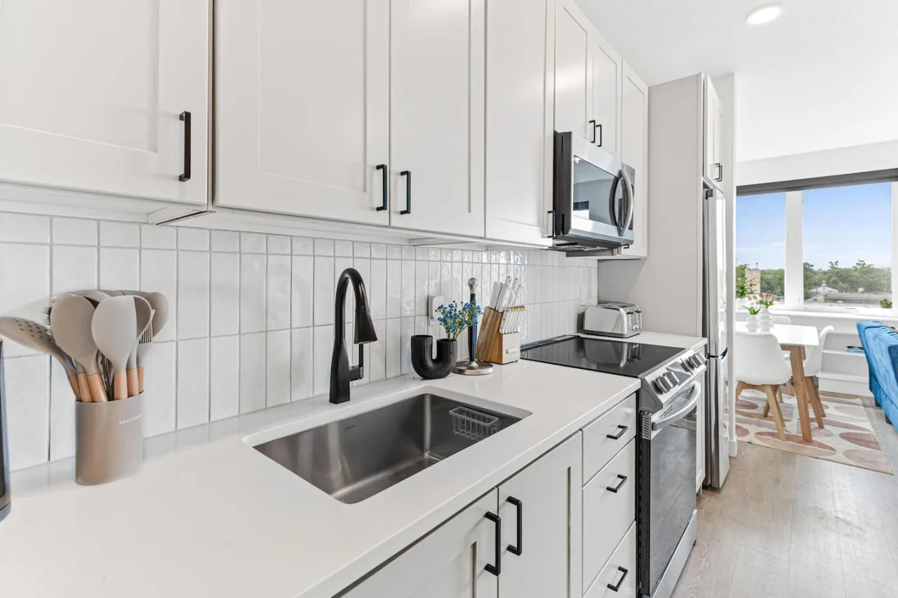 As you open the kitchen, you discover an assortment of coffee pods, and sugar, ensuring you have everything you need for a perfect morning or afternoon pick-me-up.