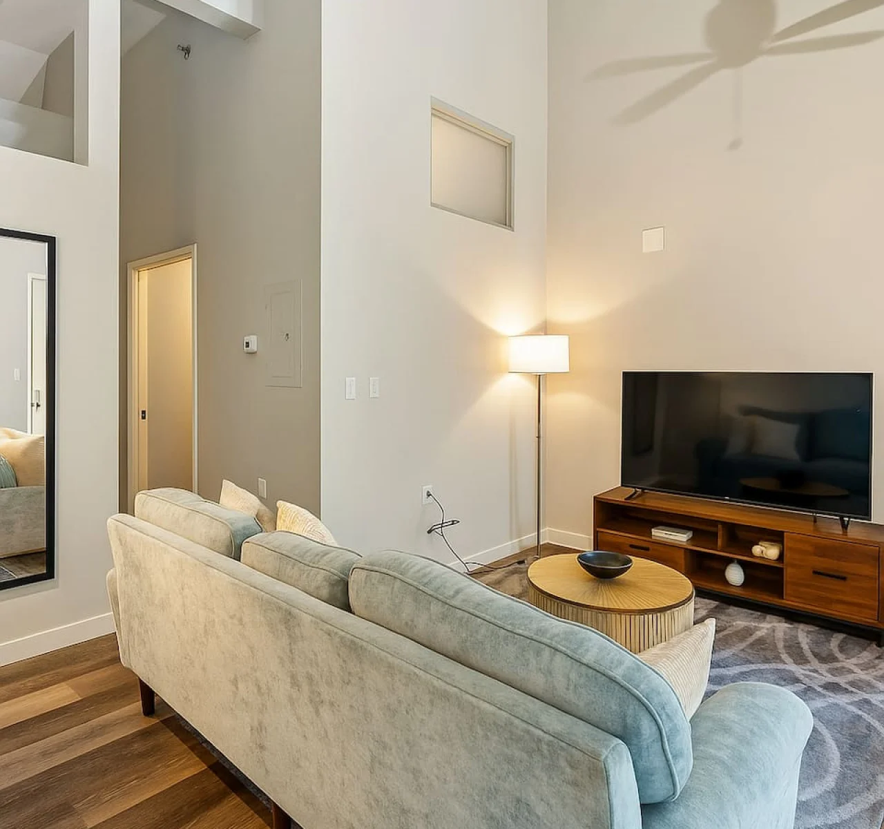 As you take a seat in the living room, the comfortable furniture and tasteful design make it easy to unwind.