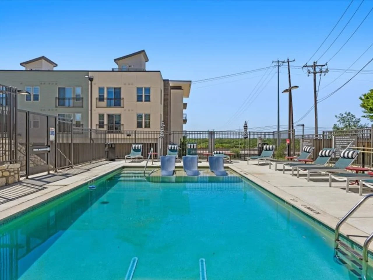 As you dip your toes into the cool water, the pool offers a refreshing retreat on a warm day.