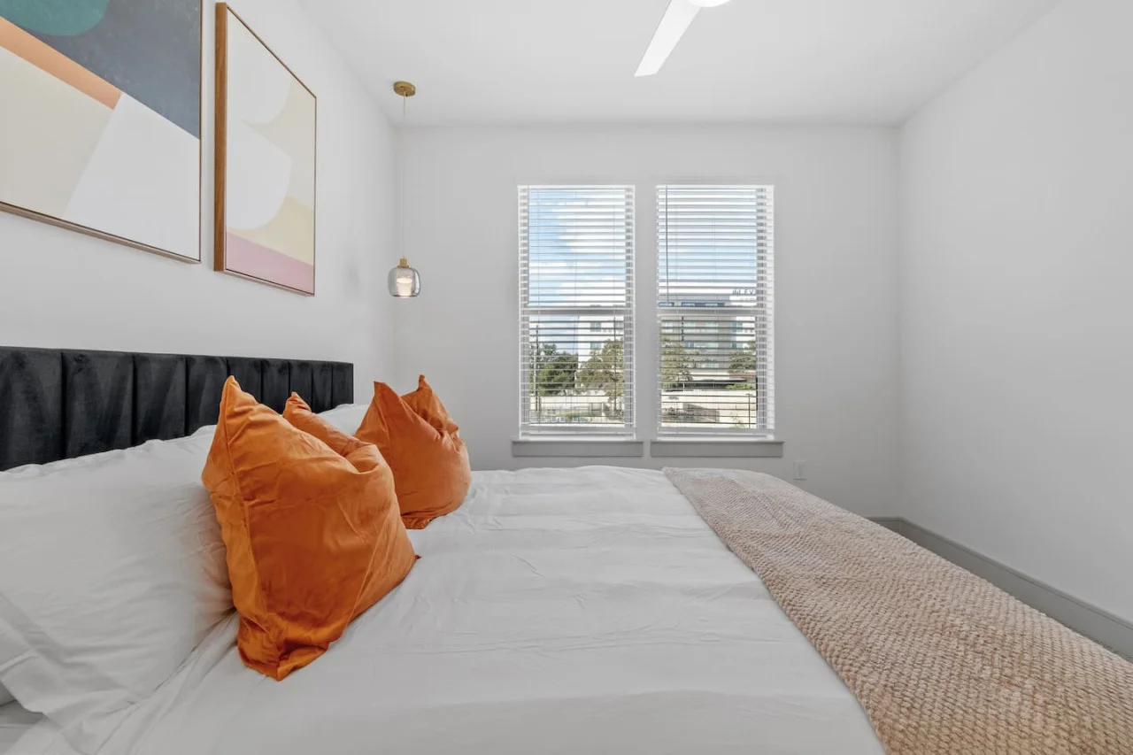 The bedroom’s serene ambiance invites you to relax, with a plush bed that promises a restful night's sleep.