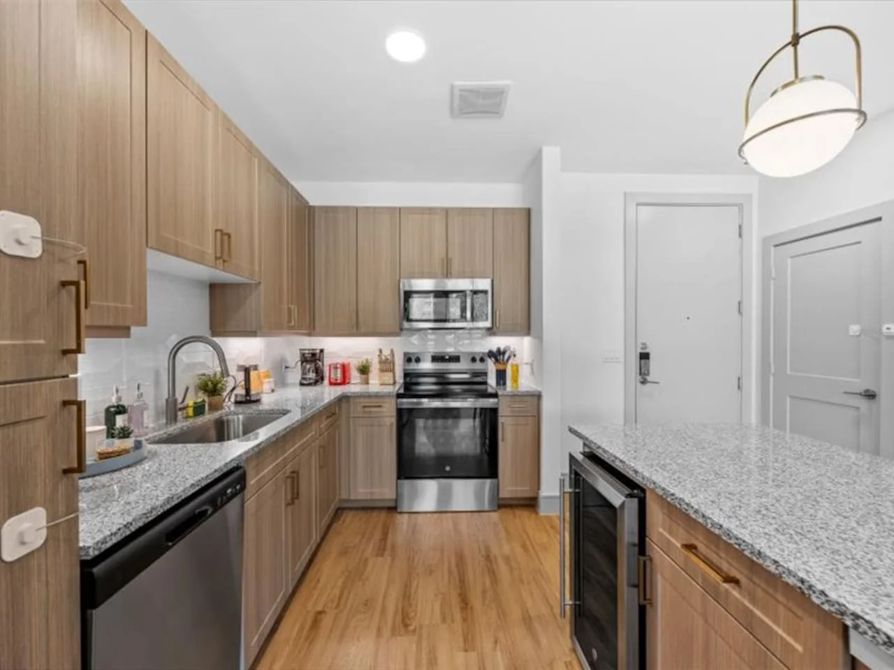 As you step into the kitchen, the clean lines and functional design make you eager to start cooking your favorite dishes.