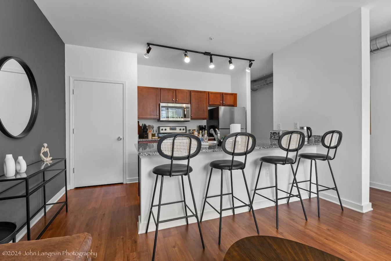 The dining area invites you to savor every moment, whether enjoying a quiet meal or hosting a festive gathering.