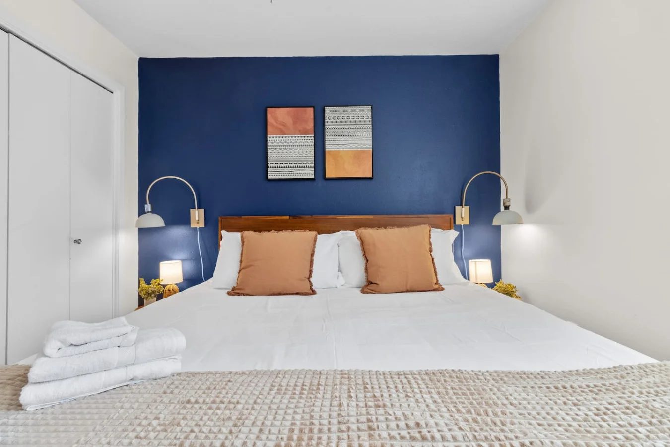 Spacious king bed with plush linens for deep rest
