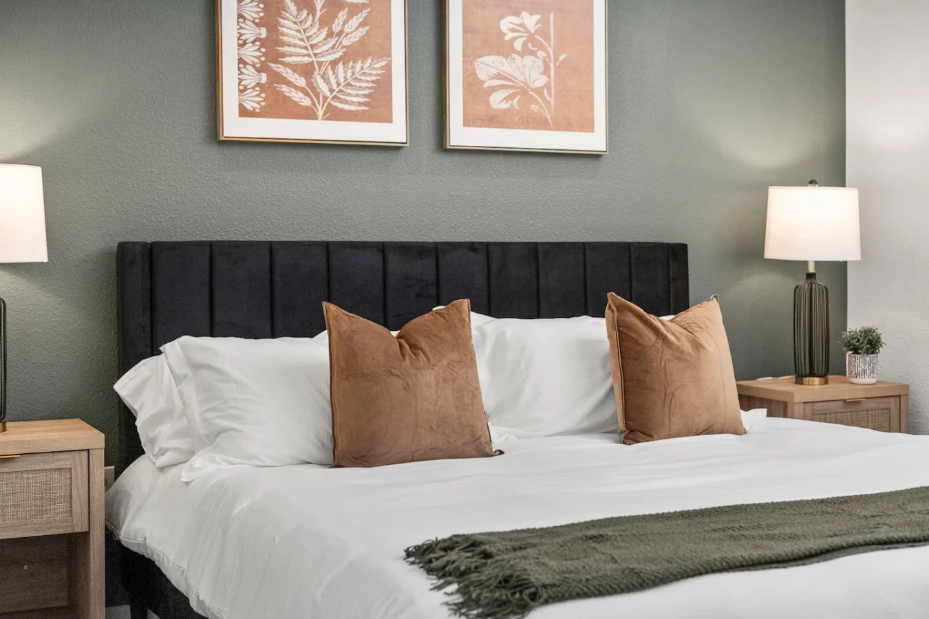 The bedroom’s serene ambiance invites you to relax, with a plush bed that promises a restful night's sleep.