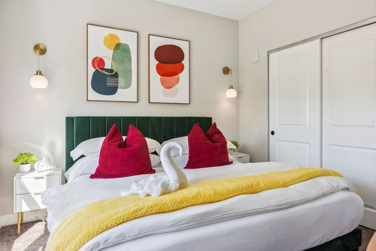 The king bed is the centerpiece of the room, offering a plush and inviting space where you can rest and recharge.