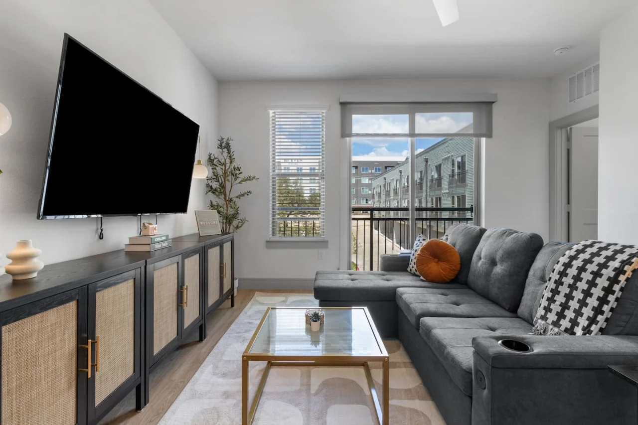 Once you enter the living room you'll find a space that feels both luxurious and cozy, perfect for unwinding after a long day.