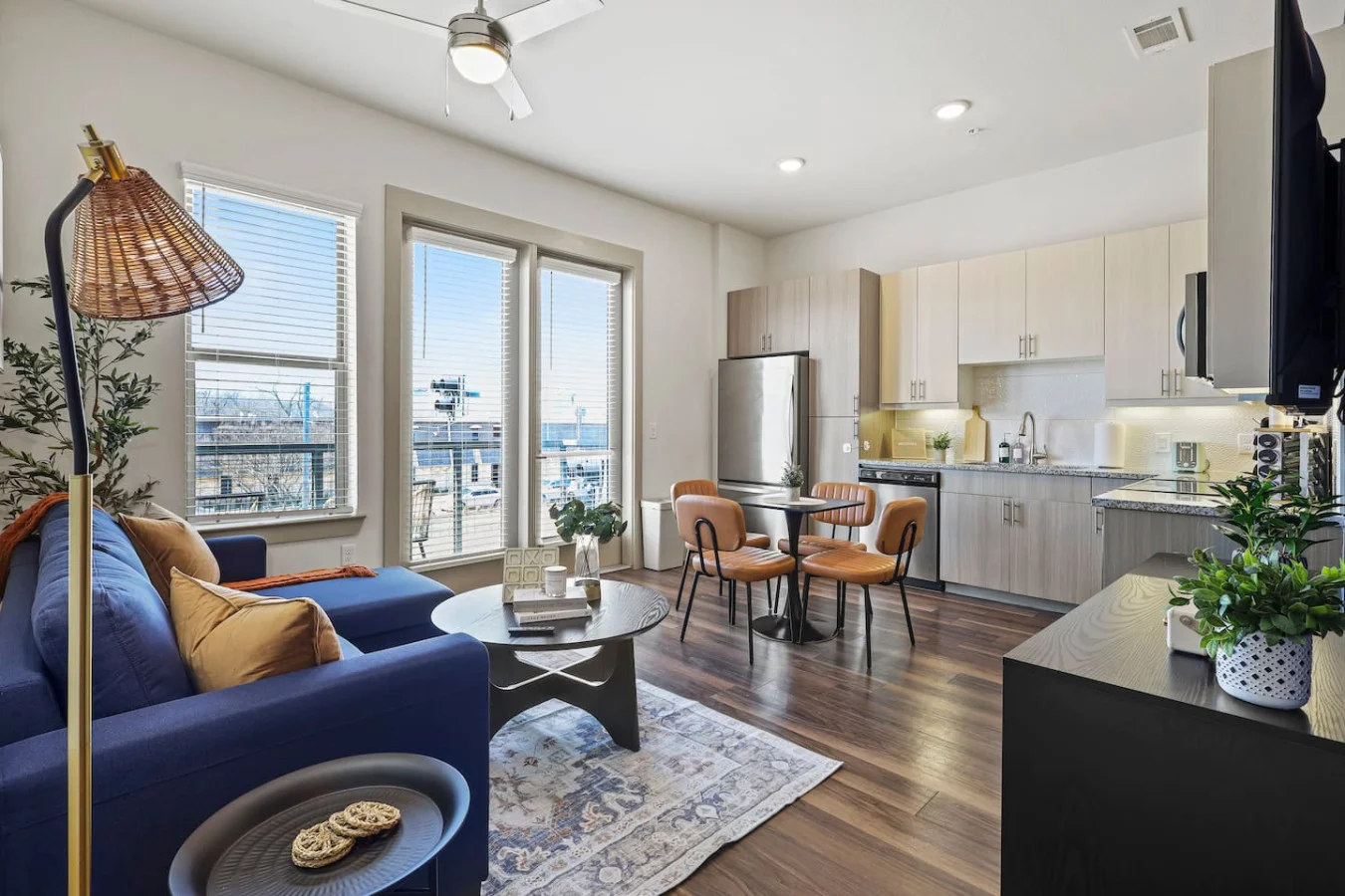 An open-concept area featuring a modern furnishings, and a stylish entertainment setup—ideal for gatherings and relaxation.