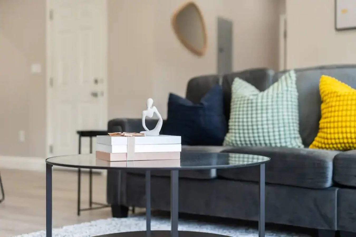 As you take a seat in the living room, the comfortable furniture and tasteful design make it easy to unwind.