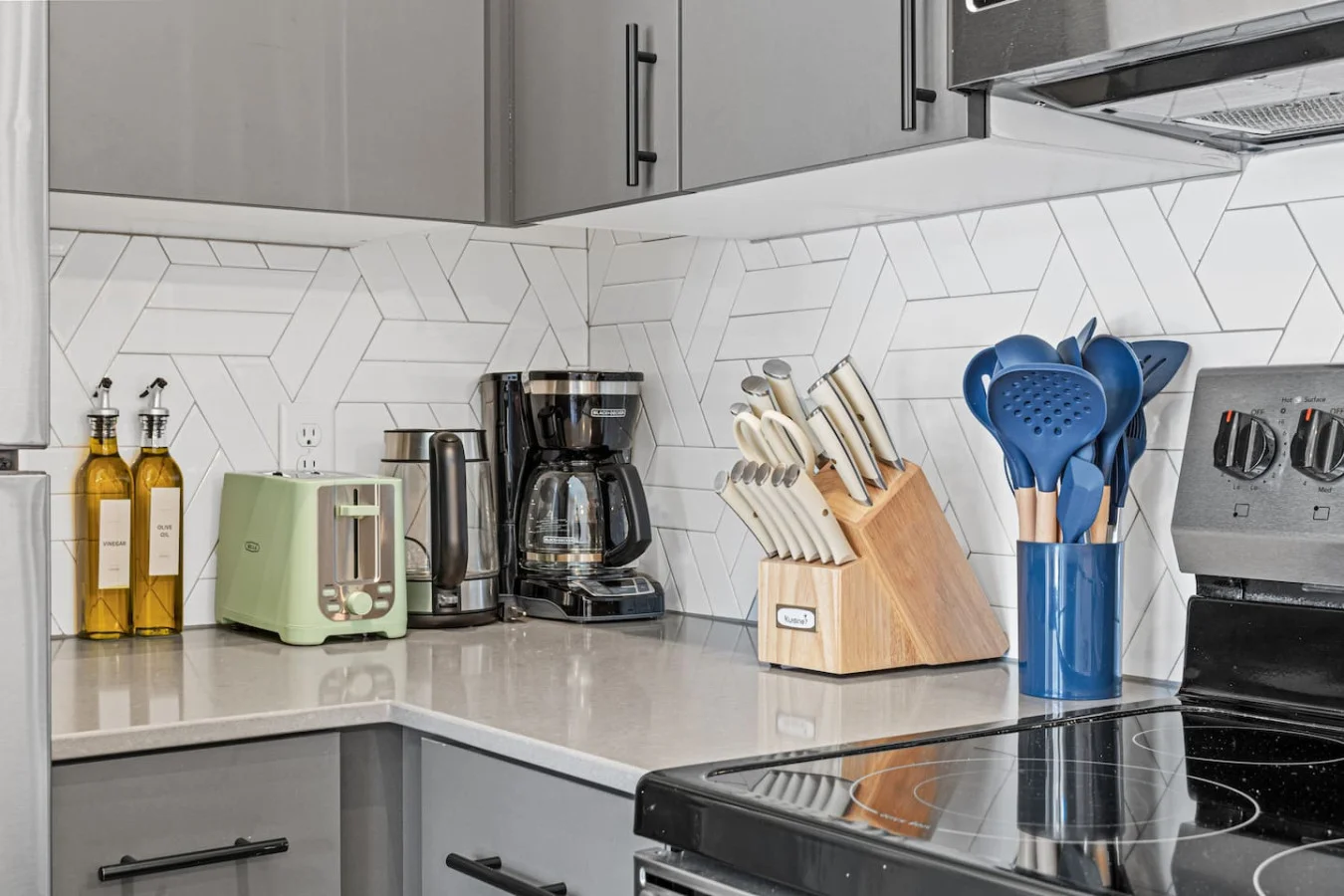 Fully equipped kitchen with all the tools you need for a perfect culinary experience. Enjoy the convenience of having everything at your fingertips!