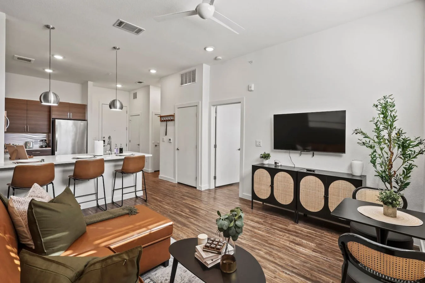 Relax in the living room and watch your favorite shows, lounging is a great way to unwind after a long day.
