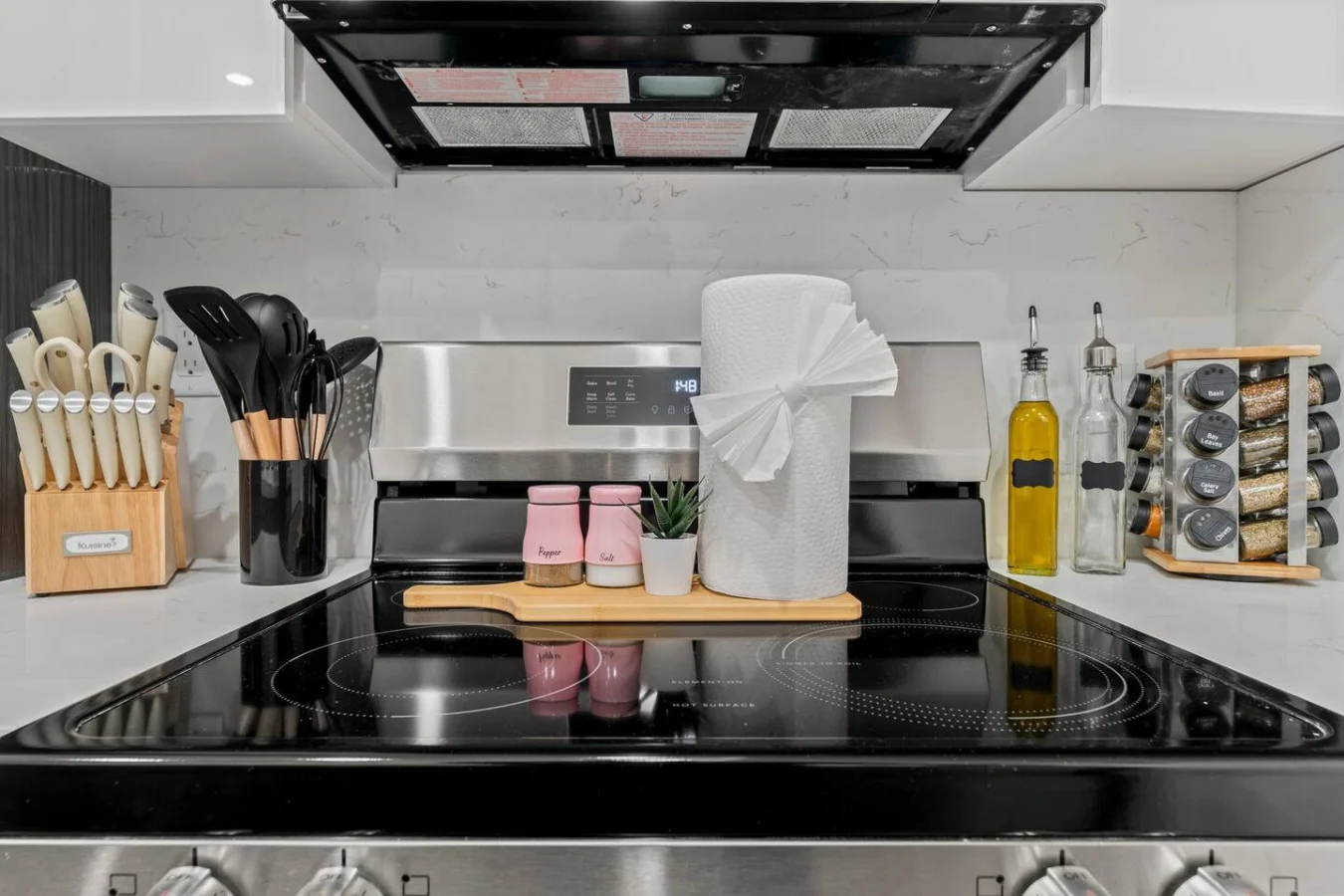 Cooking Essentials like Salt, Pepper, Oil, and various spices. Full set of Cooking Utensils