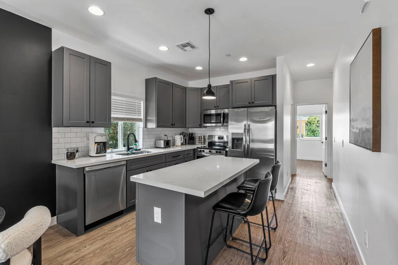 As you step into the kitchen, the clean lines and functional design make you eager to start cooking your favorite dishes.