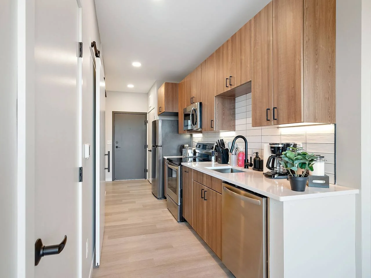 As you step into the kitchen, the clean lines and functional design make you eager to start cooking your favorite dishes.