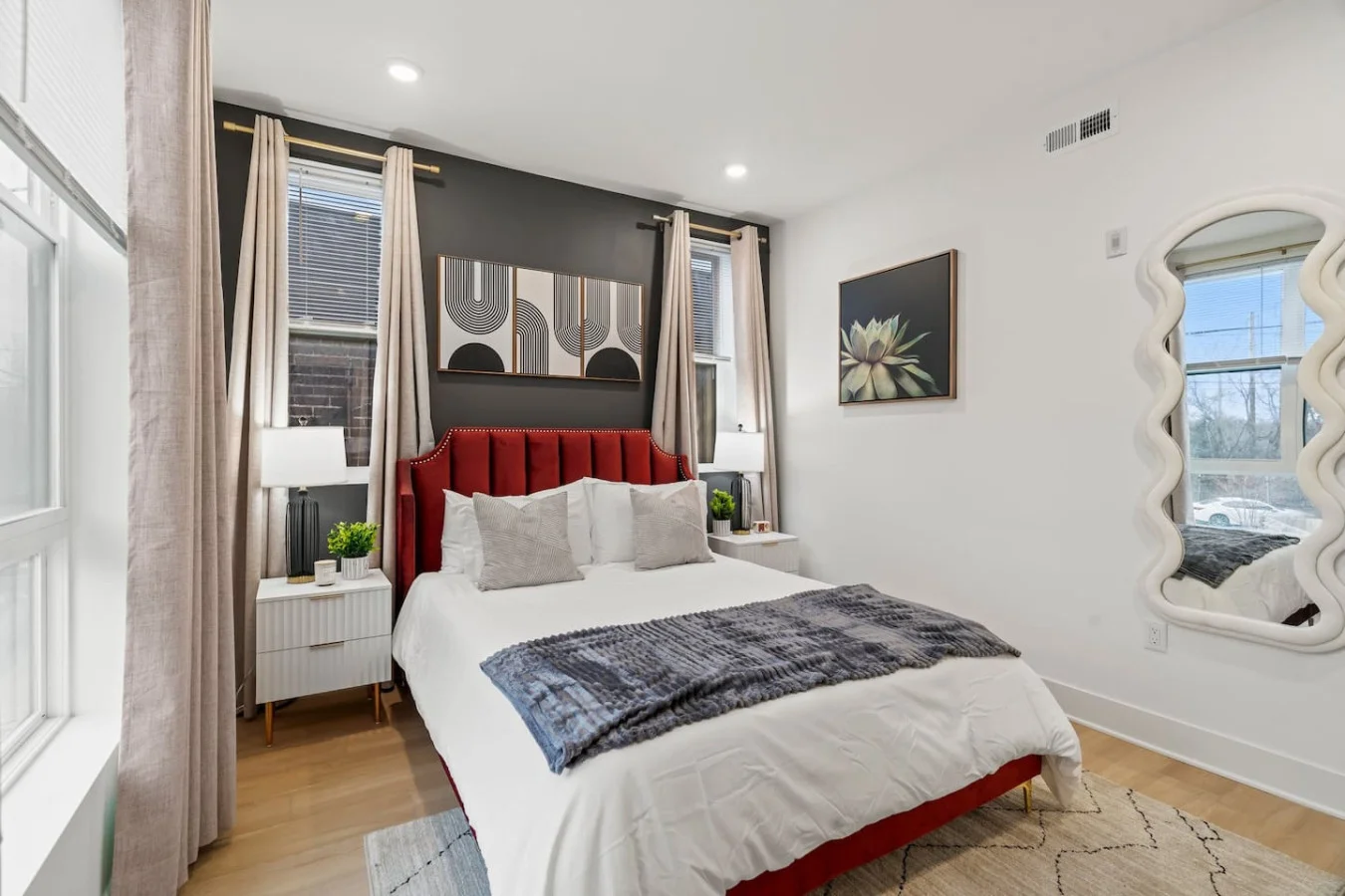 Spacious bedroom with stylish decor, perfect for unwinding after a day of exploring the local area.