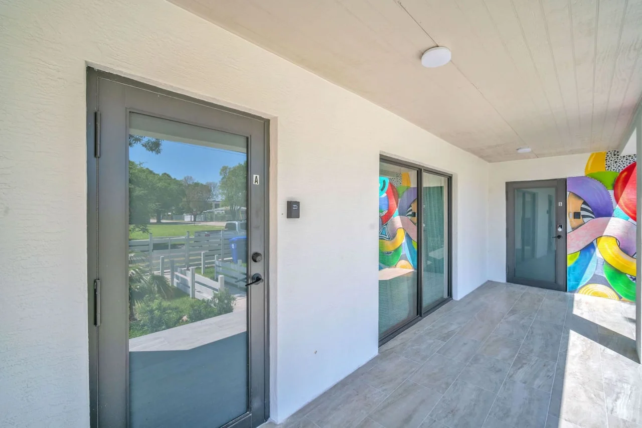 As you approach the house, the inviting entrance and beautiful exterior make you eager to explore what’s inside.