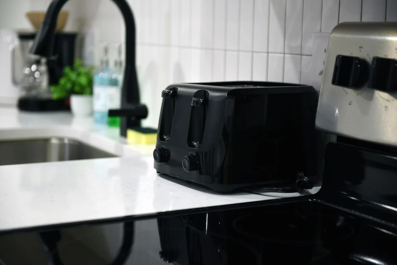 The coffee station is thoughtfully equipped with a variety of in-house consumables, including a selection of ground coffee, sweeteners, and creamers to suit every taste.