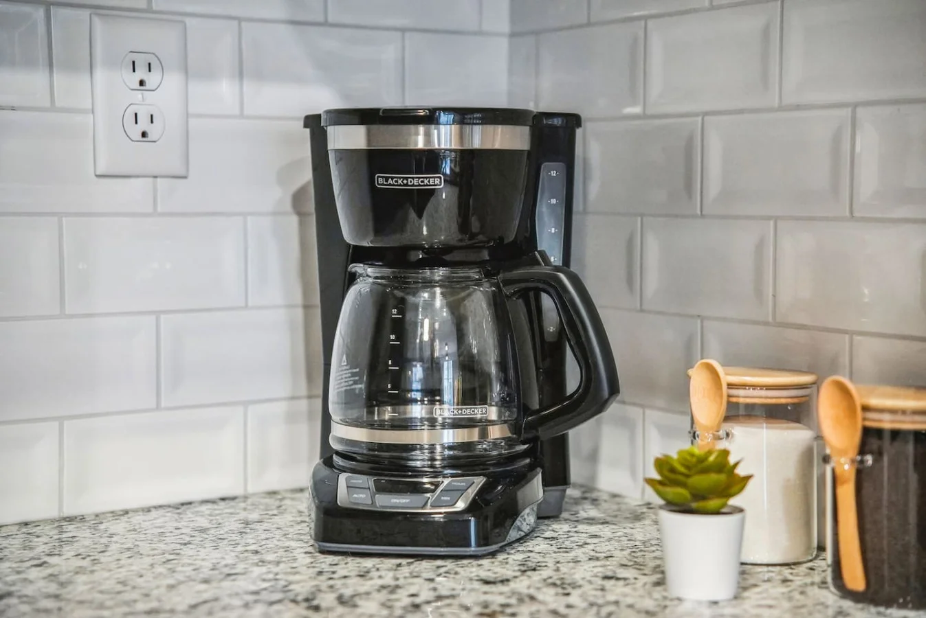 As you open the kitchen, you discover an assortment of coffee pods, and sugar, ensuring you have everything you need for a perfect morning or afternoon pick-me-up.