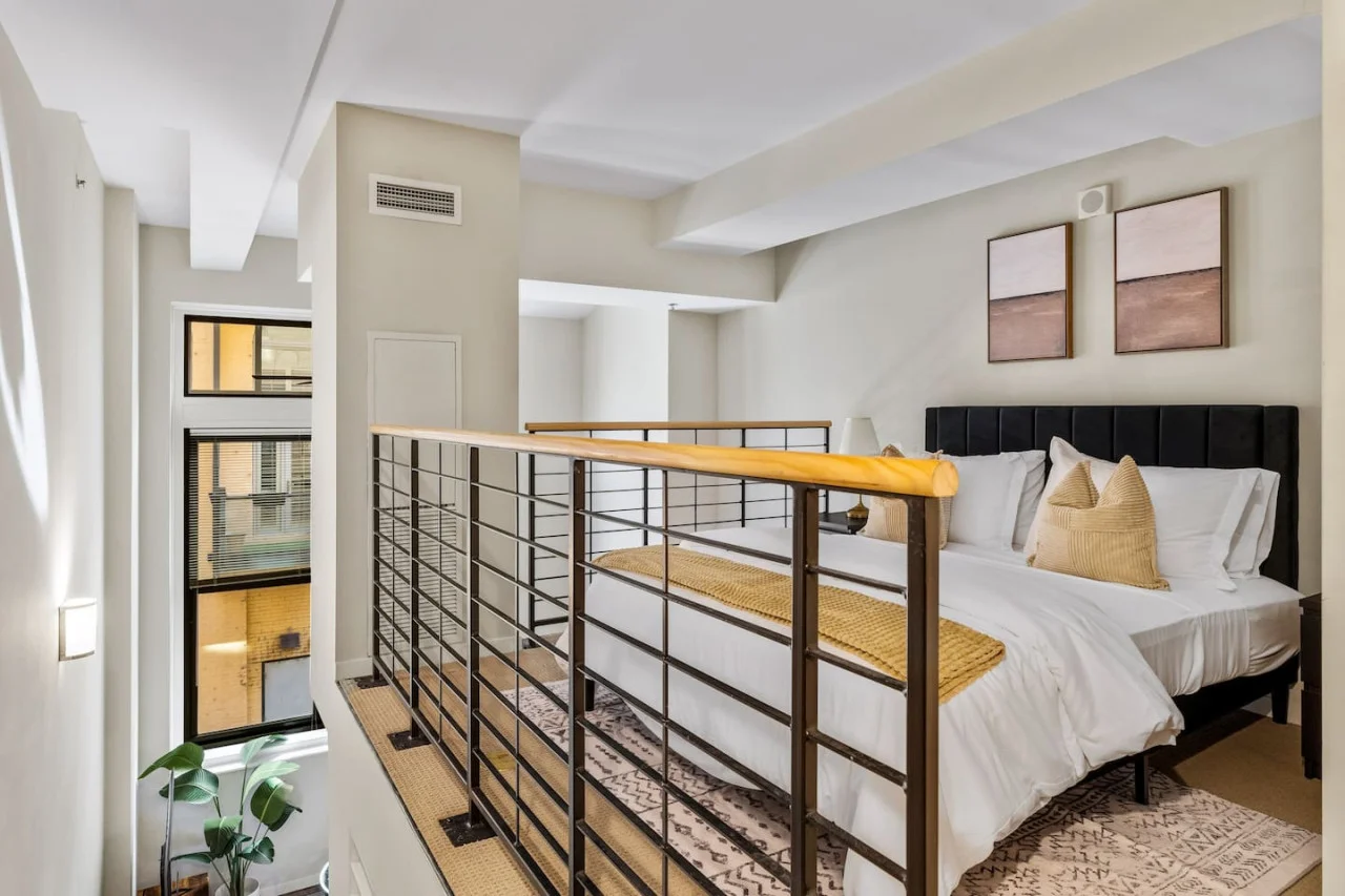 Bright and welcoming room with queen bed, perfect for families or friends traveling together.