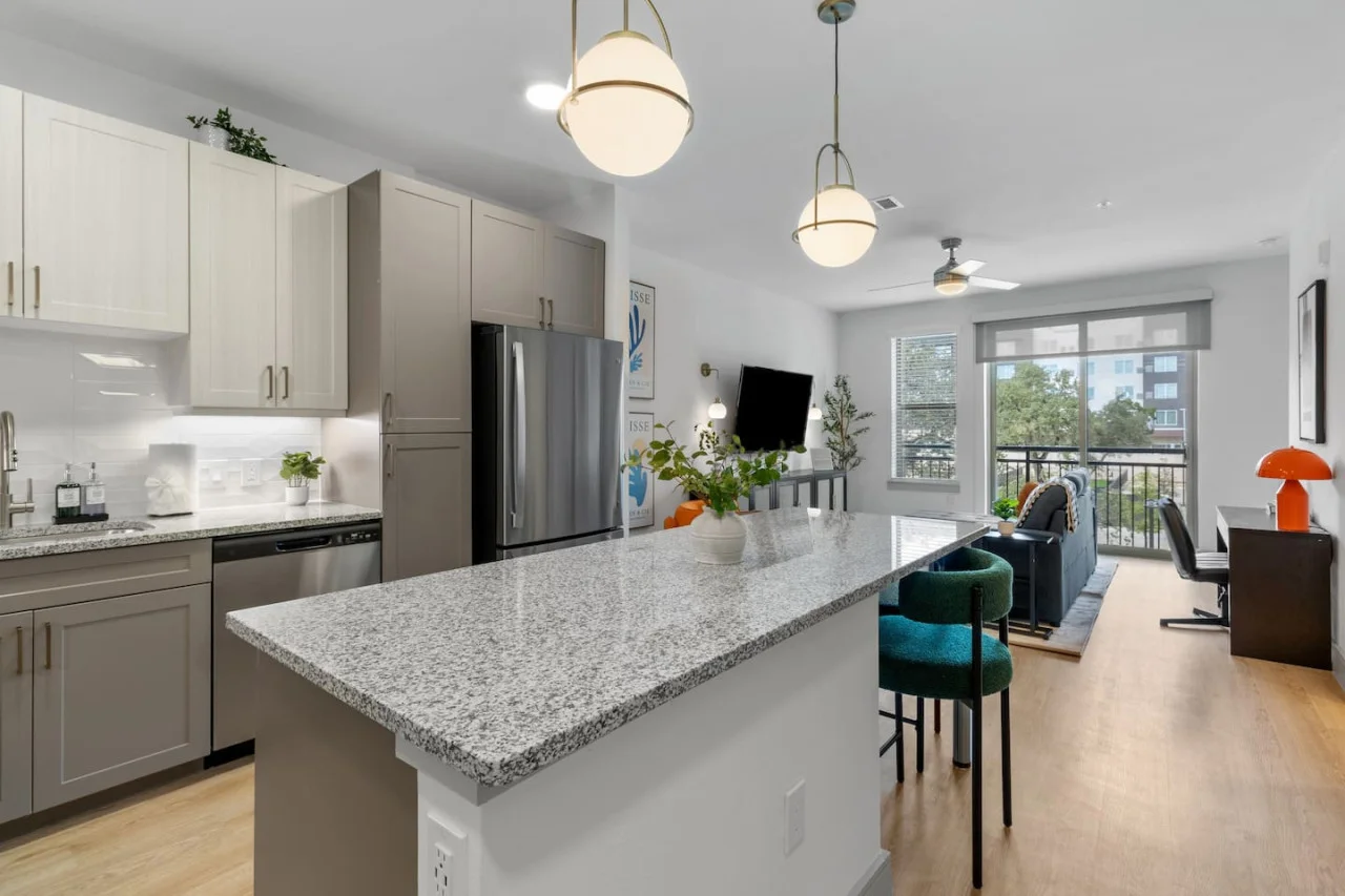 As you approach kitchen the elegant layout and well-stocked shelves make it the ideal spot to relax.