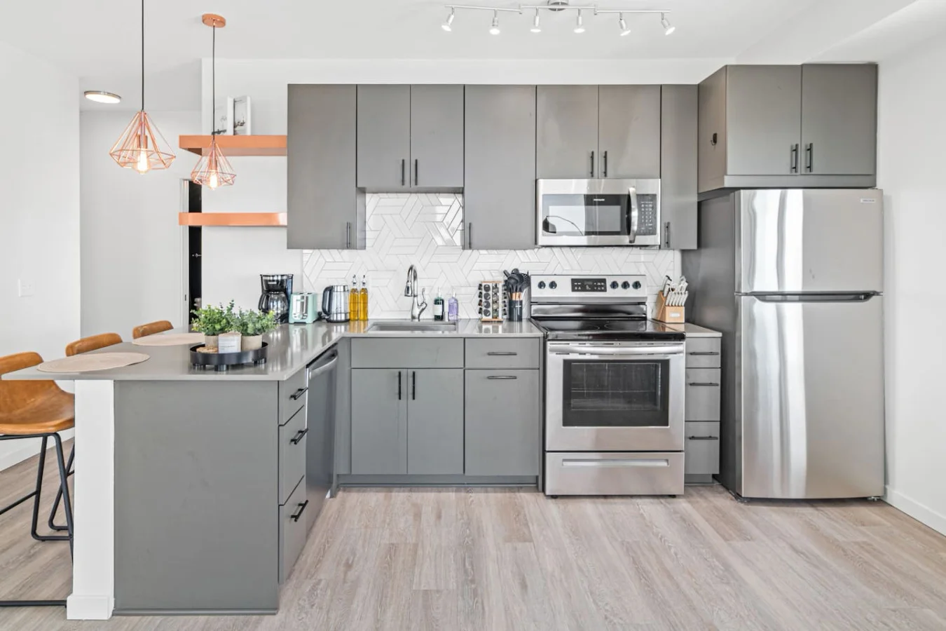 The kitchen invites you to experiment with new recipes, offering a stylish and practical space to cook and create.