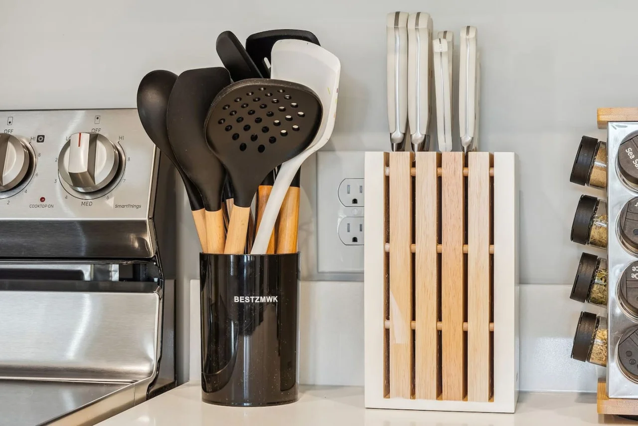 Fully equipped kitchen with all the tools you need for a perfect culinary experience. Enjoy the convenience of having everything at your fingertips!