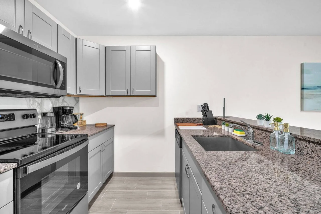 You’ll love the convenience of this fully equipped kitchen, where you can brew coffee, cook meals, or prepare snacks. The cozy layout and warm ambiance make cooking here a delightful part of your stay.
