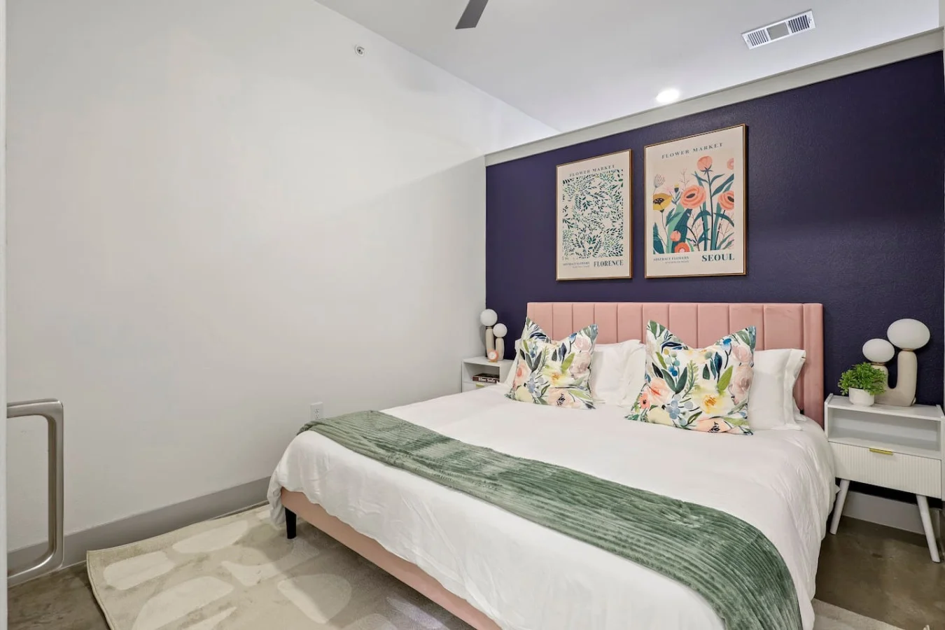 The bedroom offers a luxurious retreat, with a bed that promises restful nights and a room that feels like a private oasis.