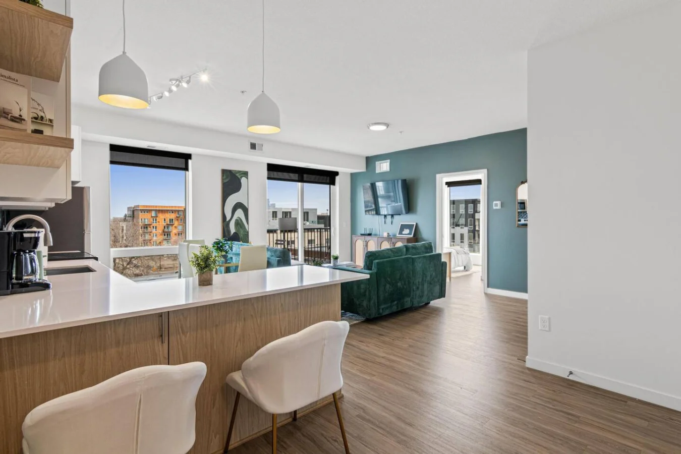 An open-concept area featuring a modern furnishings, and a stylish entertainment setup—ideal for gatherings and relaxation.