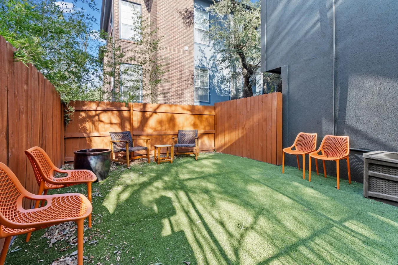 Fully fenced on-site dog park for pet guests