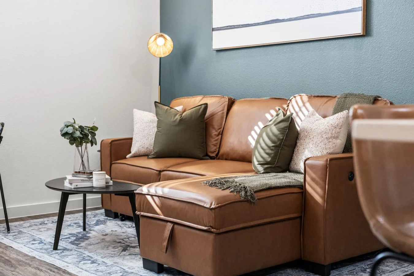 You feel a sense of peace as you step into the living room , with its inviting decor and soothing tones.