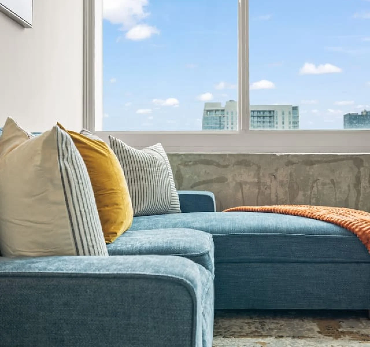 As you take a seat in the living room, the comfortable furniture and tasteful design make it easy to unwind.