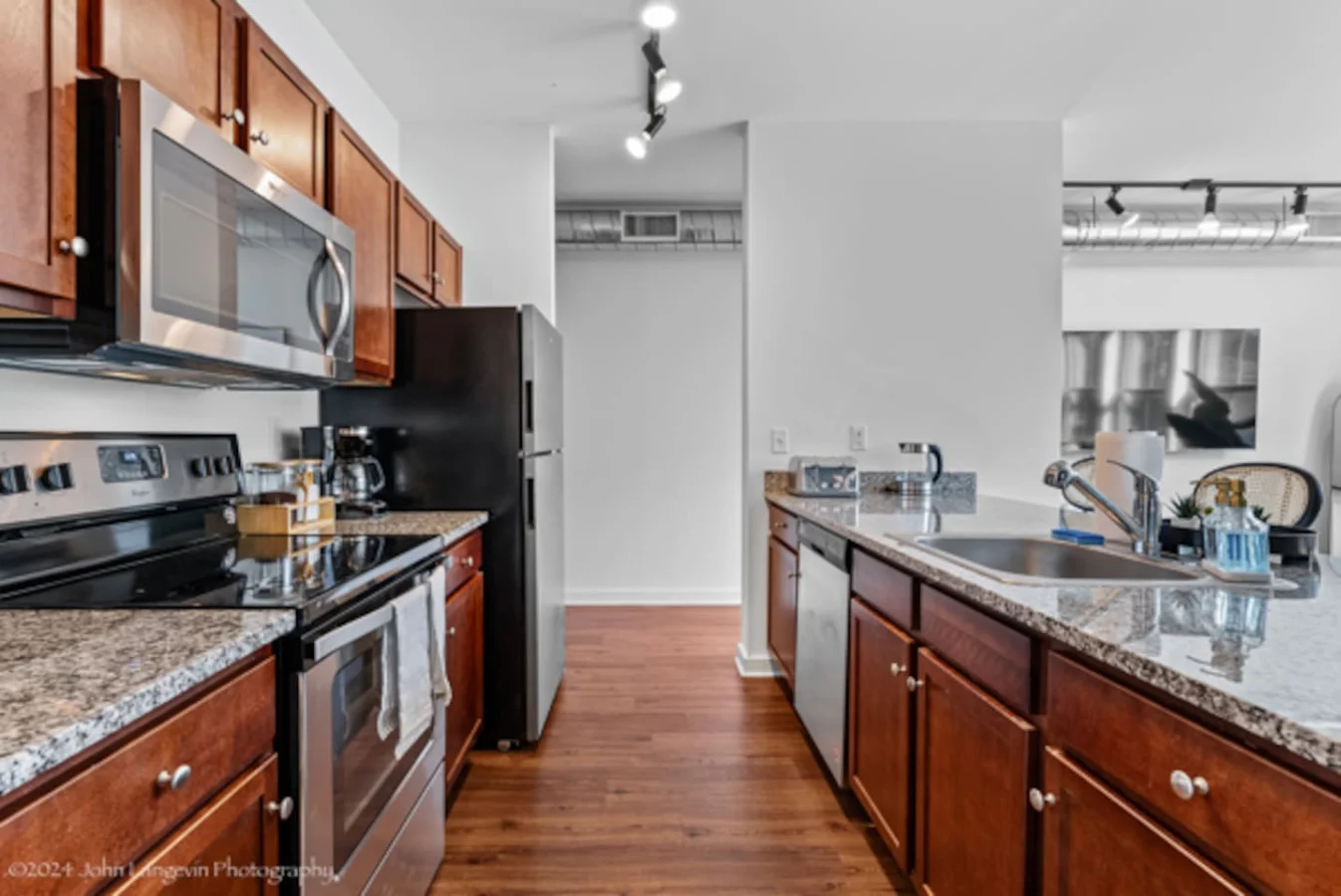 Start your mornings right with a fresh brew from our coffee maker and enjoy cooking with the fully equipped kitchen featuring premium utensils and essentials. Everything you need for a delightful stay is at your fingertips.