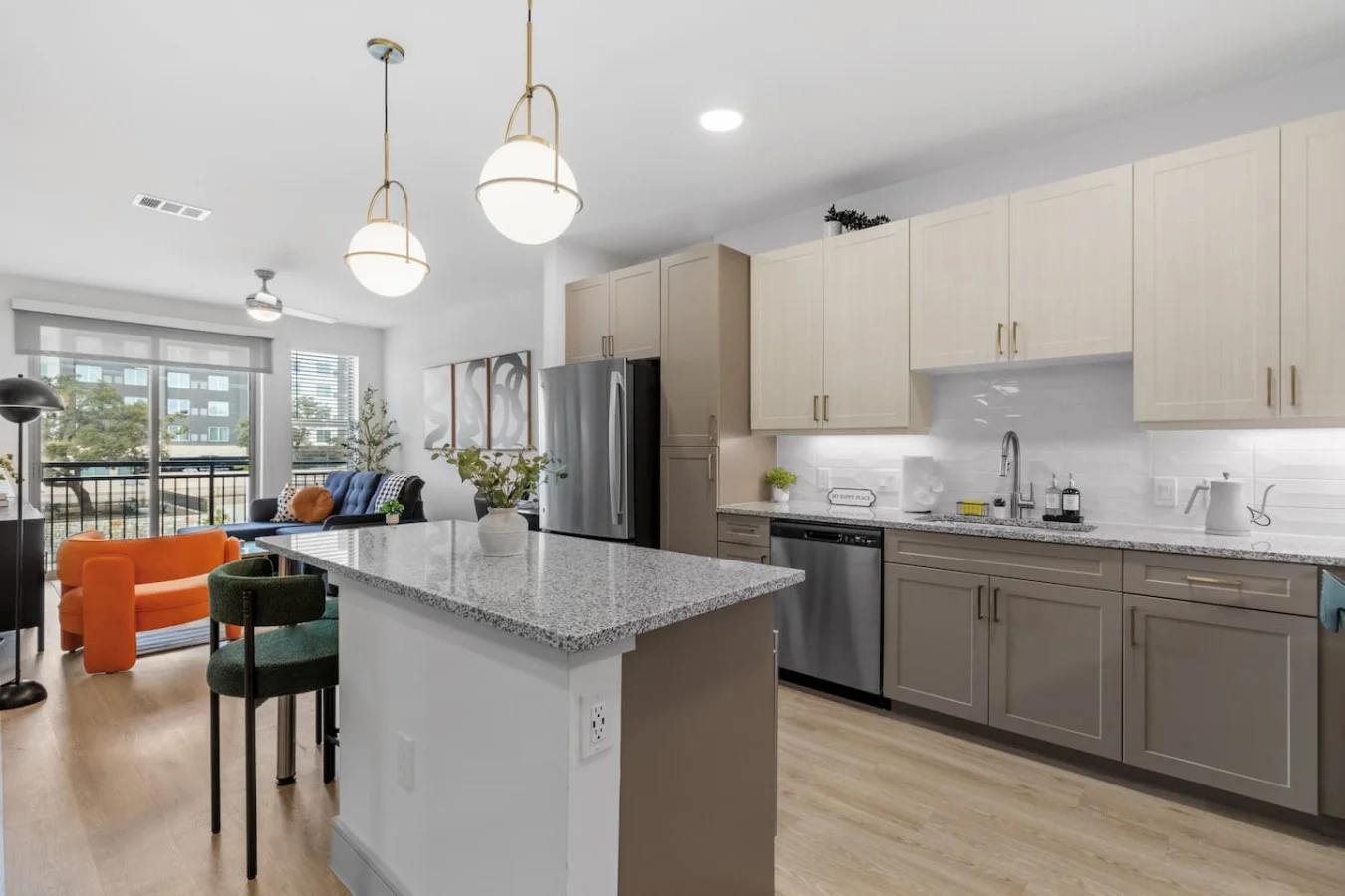 From the island to the lighting, every detail in this kitchen is crafted for modern living.