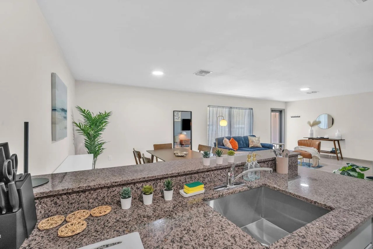 An open-concept area featuring a modern furnishings, and a stylish entertainment setup—ideal for gatherings and relaxation.