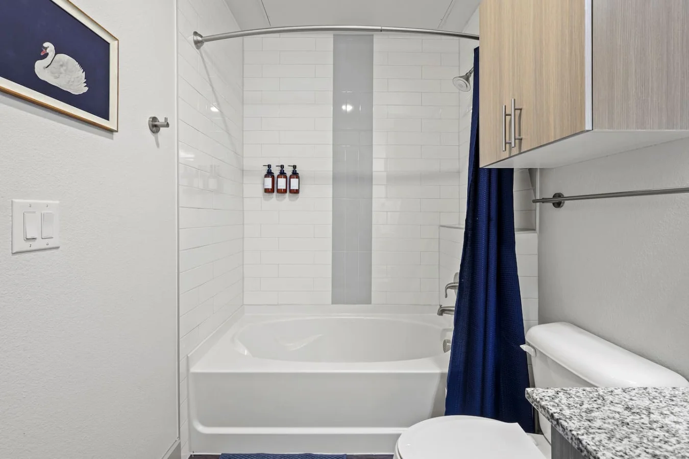 Step into this sparkling clean bathroom, offering you a refreshing retreat. Enjoy a hot shower surrounded by serene forest vibes, and wrap yourself in soft towels after a long day of exploring or relaxing.