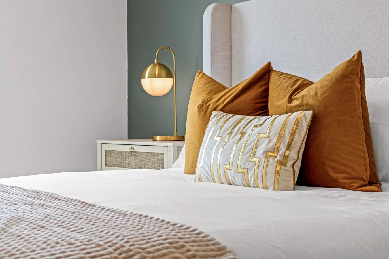 The bedroom’s serene ambiance invites you to relax, with a plush bed that promises a restful night's sleep.