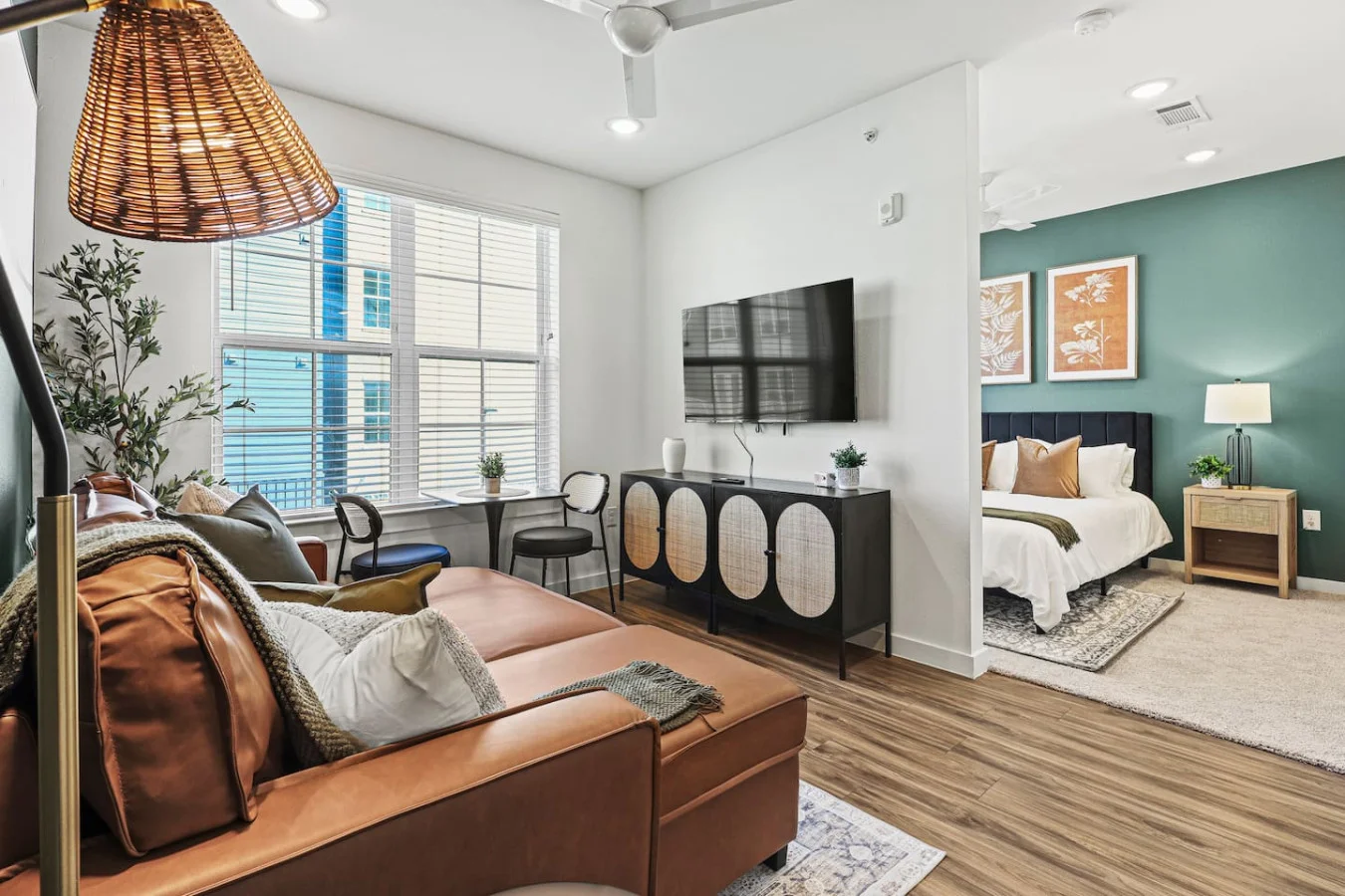 The living room is filled with natural light, creating a bright and welcoming space that invites relaxation.