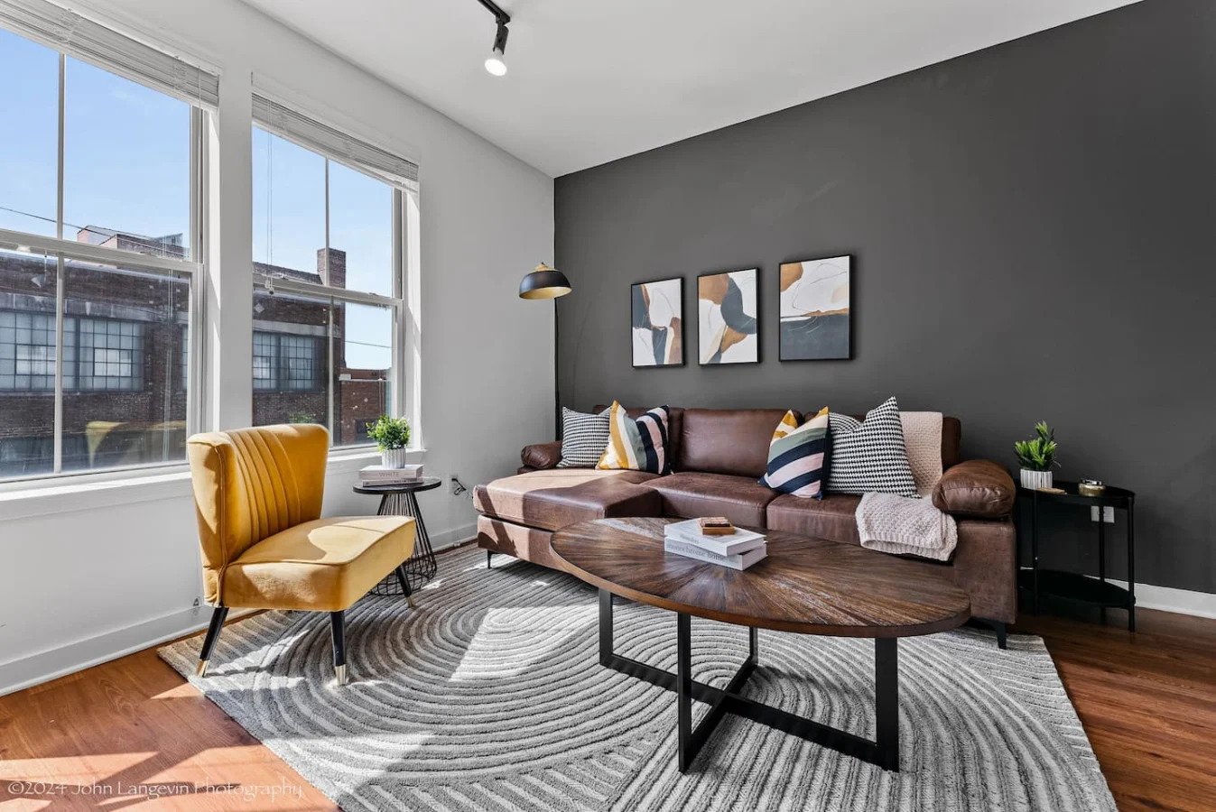 As you take a seat in the living room, the comfortable furniture and tasteful design make it easy to unwind.