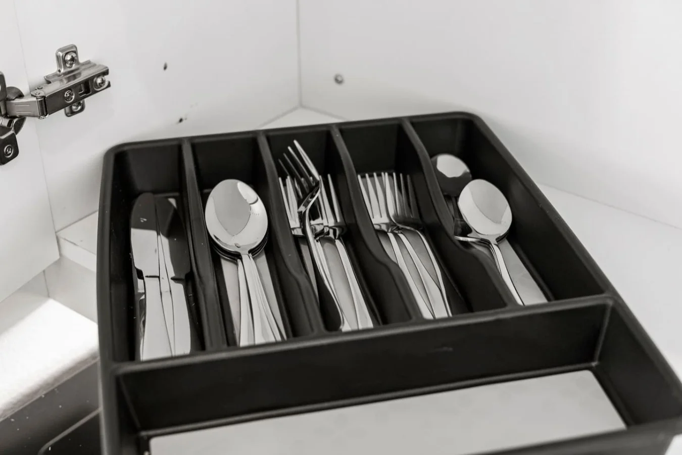 Kitchen utensils with scissors, measuring cups, grater, wine opener, can opener