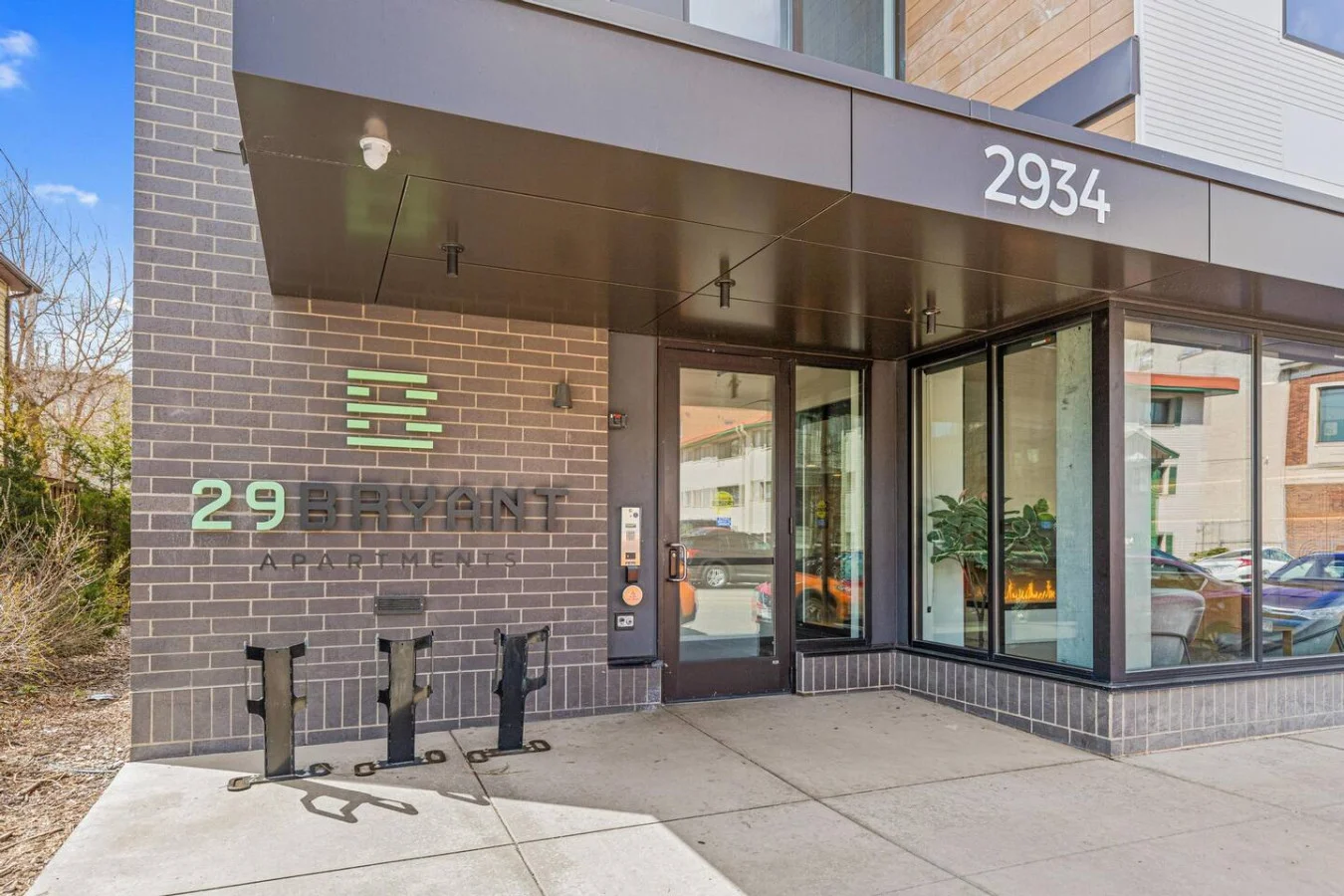 The outdoor area is a blend of modern and classic design elements, creating a welcoming and stylish facade.