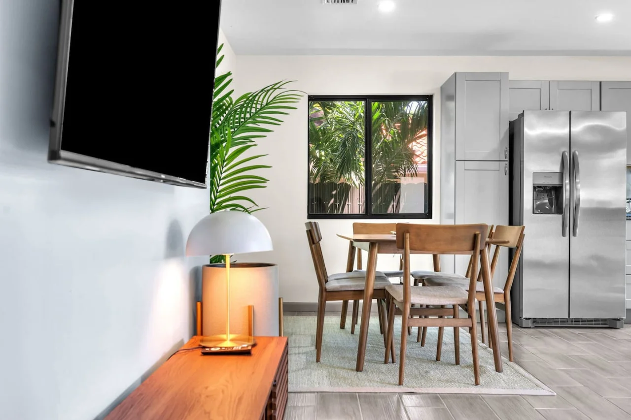 Compact yet stylish dining setup, perfectly situated near the kitchen.