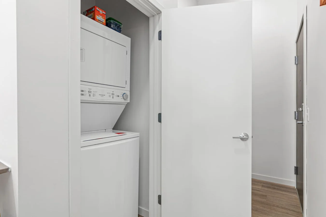 Convenient laundry room with washer, dryer, and all necessary supplies, making it easy to take care of your laundry needs.