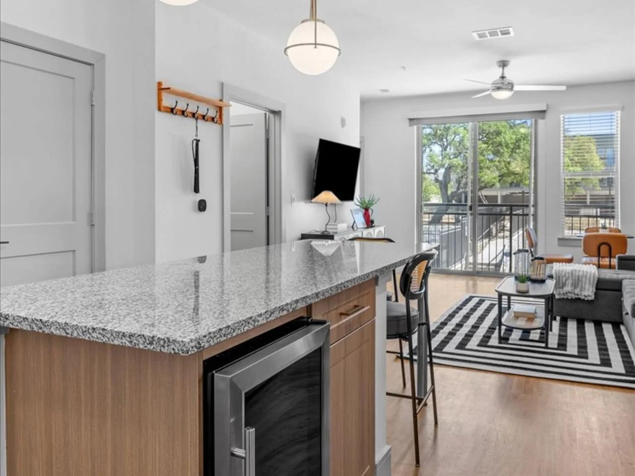 The kitchen invites you to experiment with new recipes, offering a stylish and practical space to cook and create.
