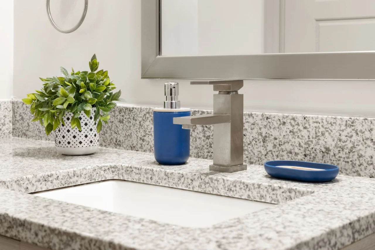 You feel a sense of calm as you enter the bathroom, where the thoughtful design and high-quality materials create a serene environment.