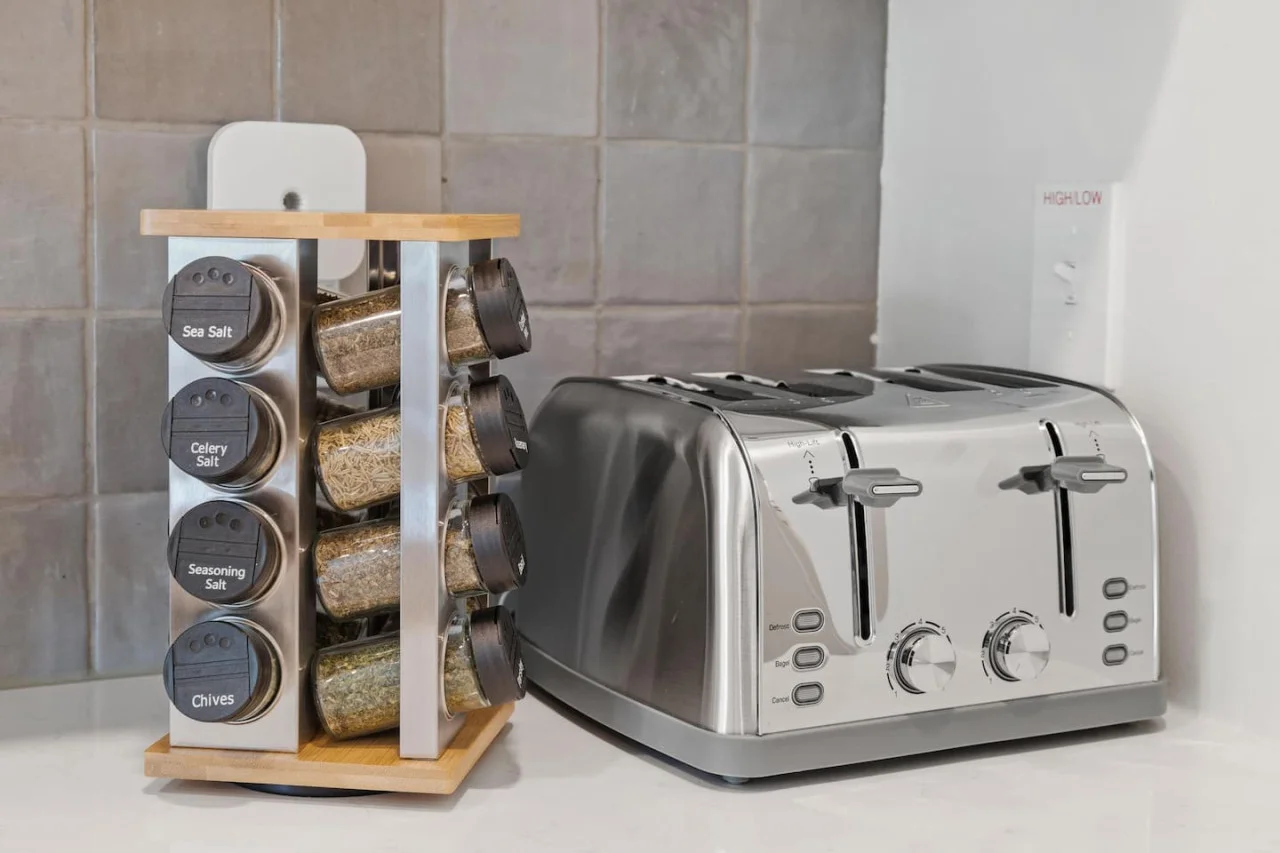 Stainless steel 4 Piece bread toaster - Spice rack on counter