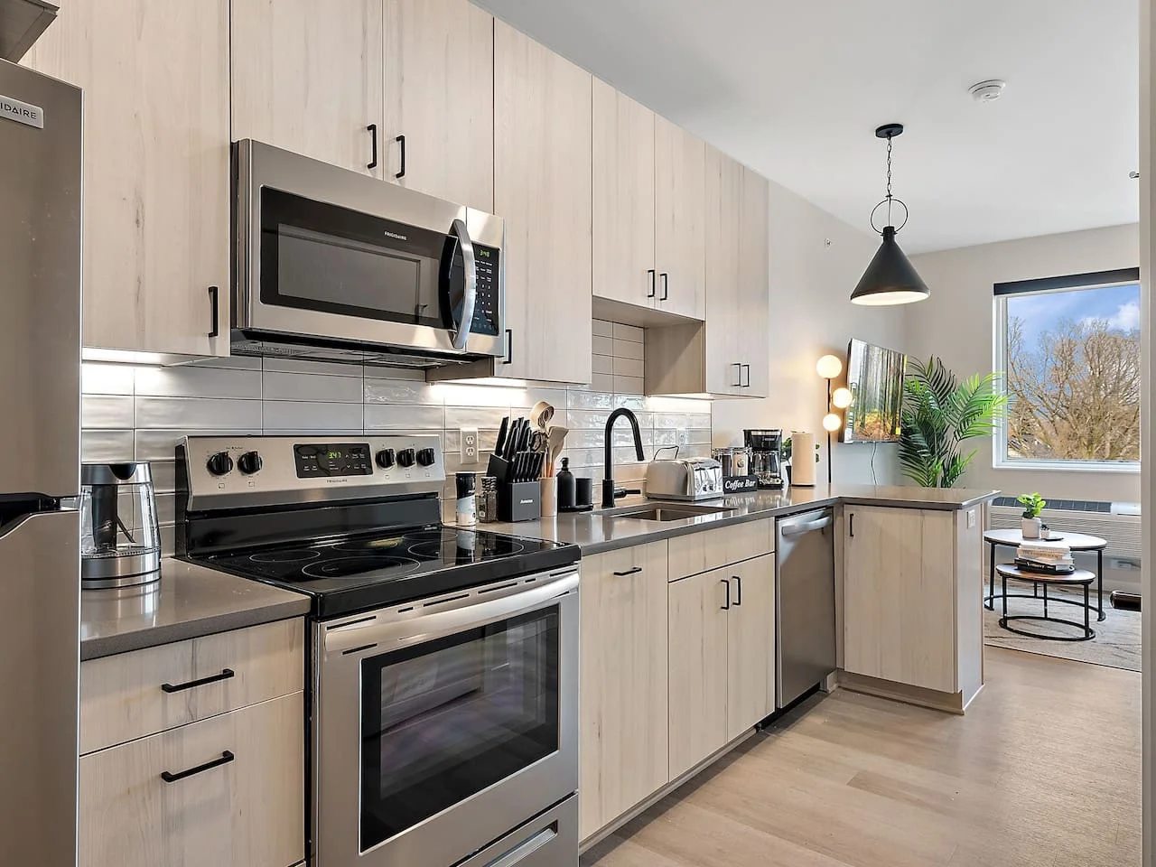 The kitchen’s open layout allows you to move freely as you prepare meals, with everything you need at your fingertips.