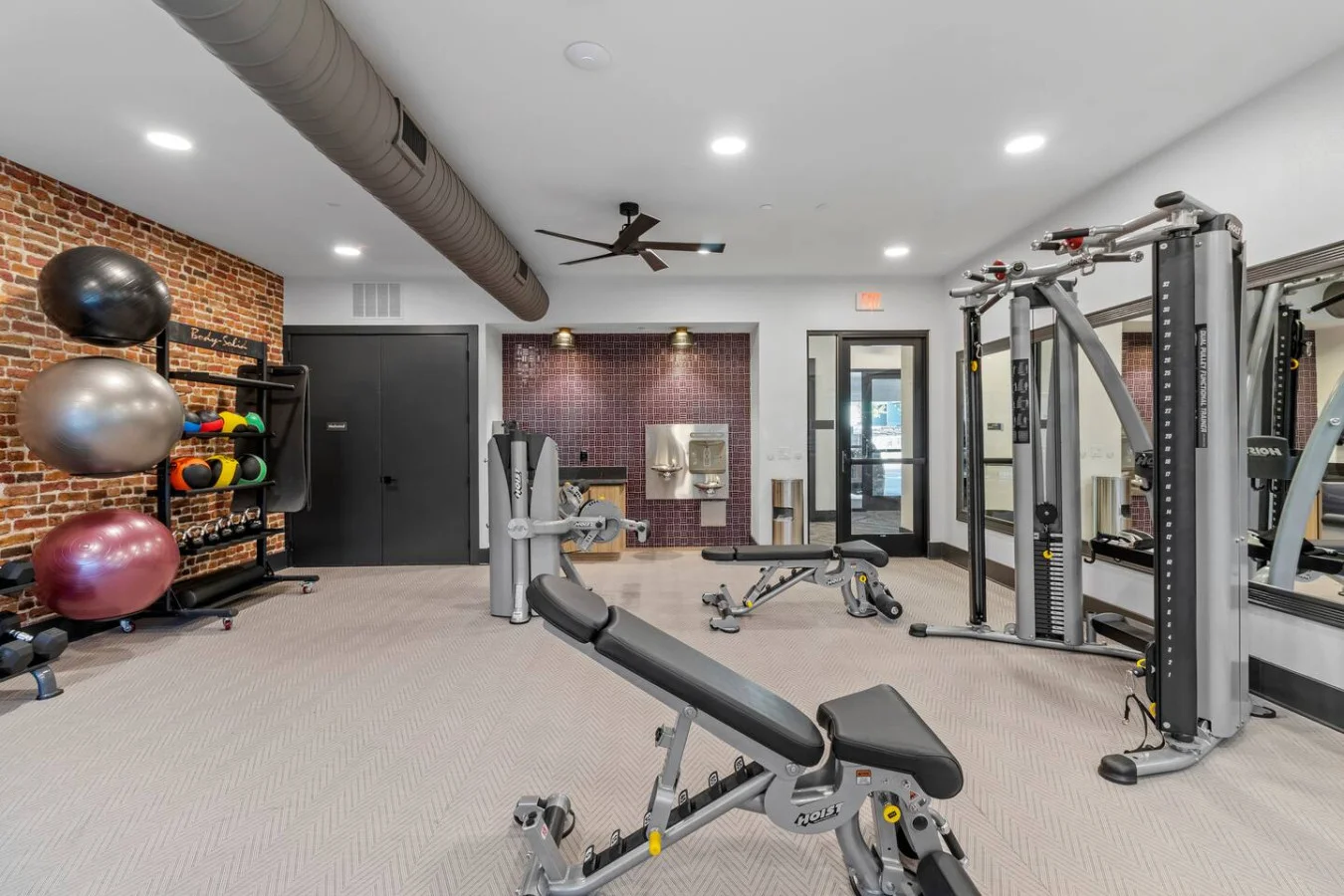 Open fitness space for warm-ups, stretches, and core exercises.