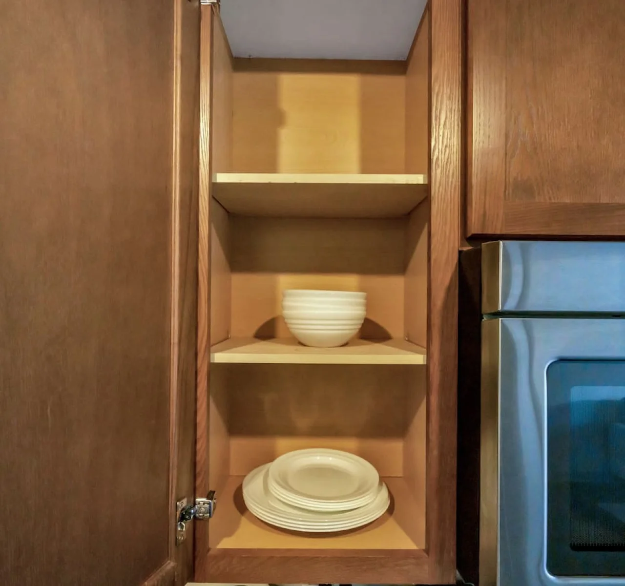 As you approach kitchen the elegant layout and well-stocked shelves make it the ideal spot to relax.